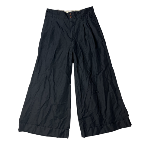 „Comme des Garçons“ kelnės