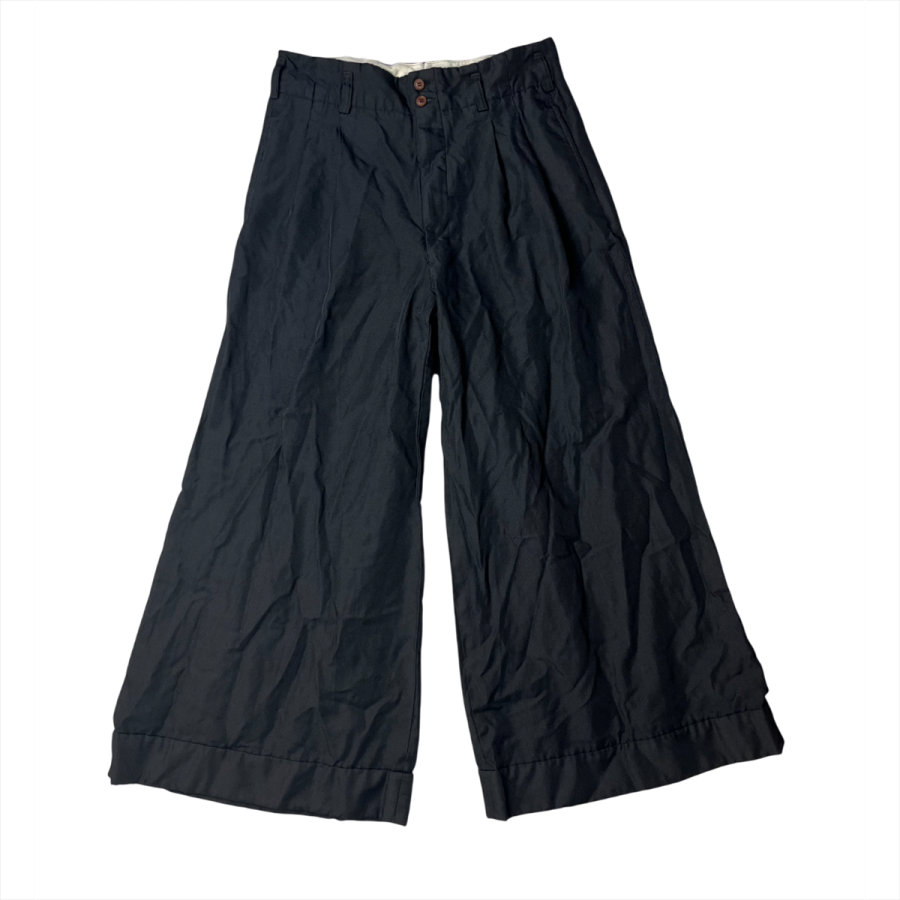 „Comme des Garçons“ kelnės