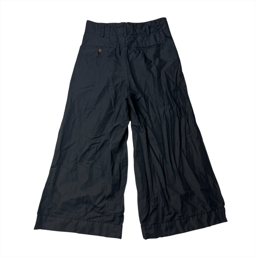 „Comme des Garçons“ kelnės